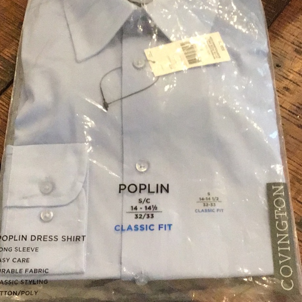 Men’s / unisex NEW button down shirt.  Blue.  New